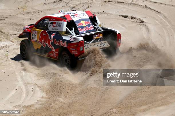 Nasser Al-Attiyah of Qatar and Toyota Gazoo Racing drives with co-driver Matthieu Baumel of France in the Hilux Toyota car in the Classe : T1.1 : 4x4...