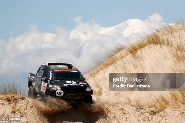 Benediktas Vanagas of Lithuania and General Financing Team Pitlane drives with co-driver Rozwadowski Sebastian of Poland in the Hilux Toyota car in...