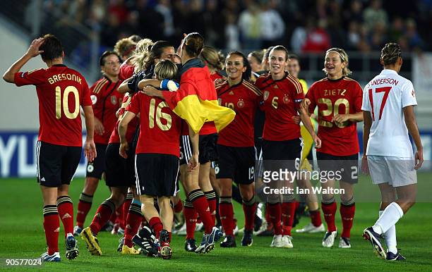 Germany players celebrate after winning the UEFA Women's Euro 2009 Final match between England and Germany at the Helsinki Olympic Stadium on...