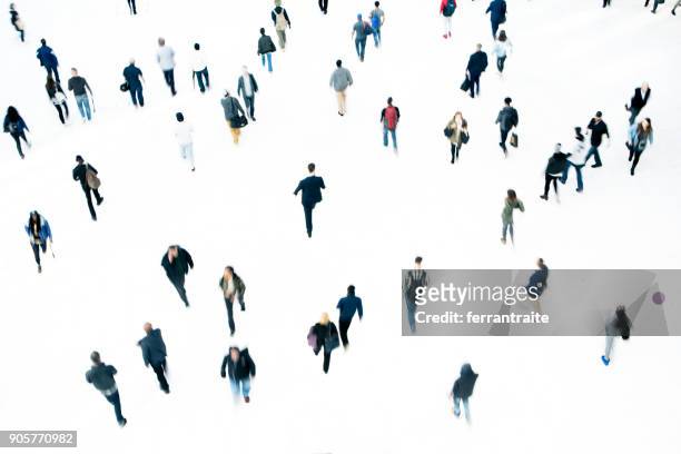 commuters - crowd of people walking stock pictures, royalty-free photos & images