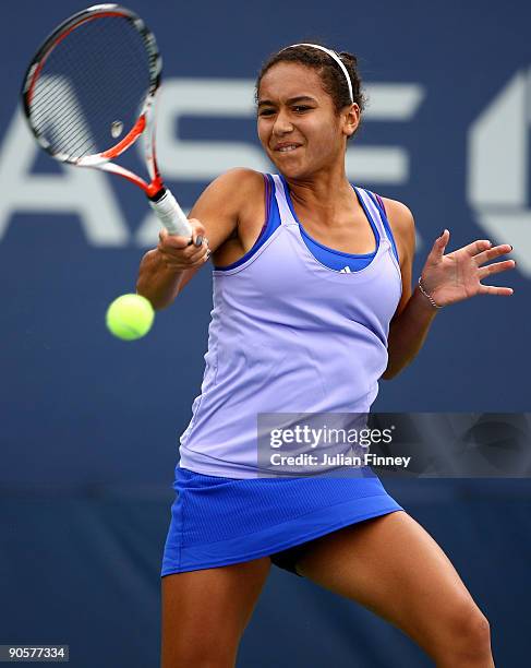 Heather Watson of Great Britain returns a shot to Annika Beck of Germany during the Girls' Singles third round match on day eleven of the 2009 U.S....