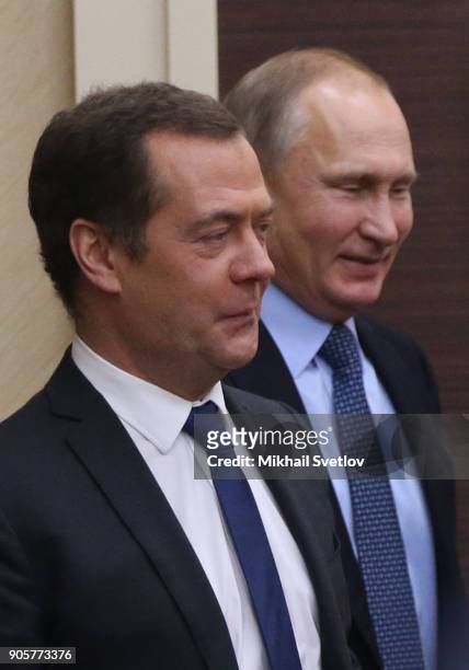 Russian President Vladimir Putin and Prime Miniter Dmitry Medvedev arrive to their weekly meeting with minister of Russian Government at...