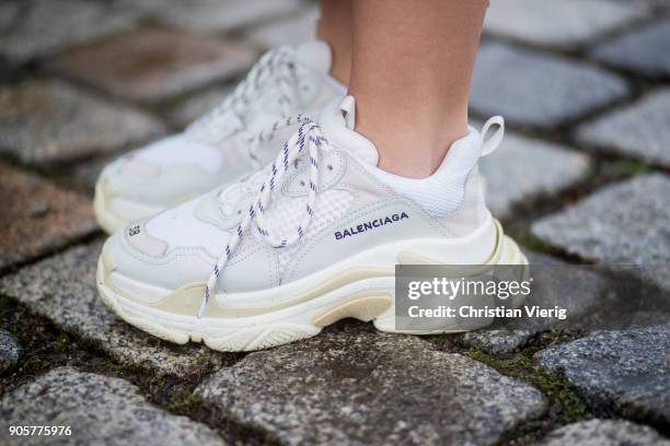 Aylin Koenig wearing knit H&M, Zara skirt, Balenciaga sneakers, green Prada bag is seen during the Berlin Fashion Week January 2018 at Bauakademie on...