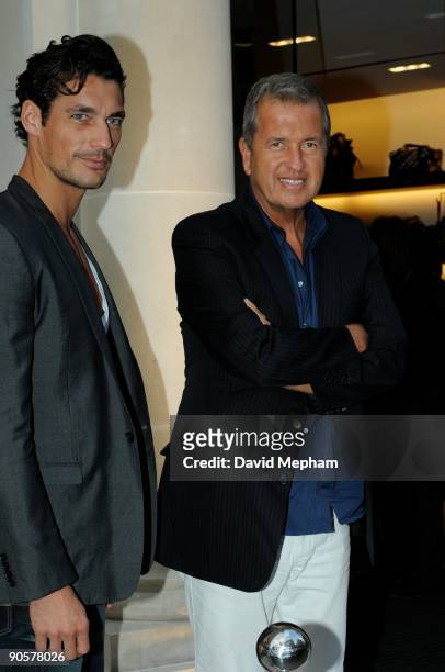 Mario Testino and David Gandy arrive at Fashion's Night Out: Vogue & Burberry Cocktail Party on September 10, 2009 in London, England.