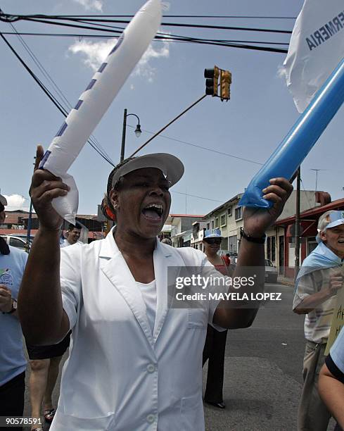 Social Security worker shouts slogans against the Caja Costarricense de Seguro Social September 10 in San Jose during a demonstration for better...