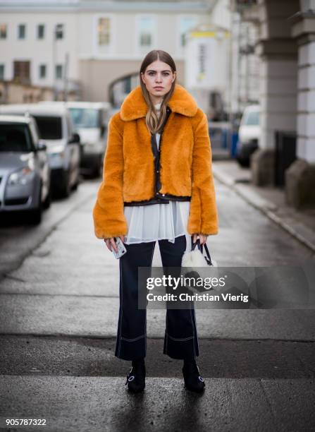 Swantje Soemmer wearing yellow H&M trend jacket, blouse and pants Sportmax, Longchamp bag, Zara ankle boots is seen outside Der Berliner Modesalon...