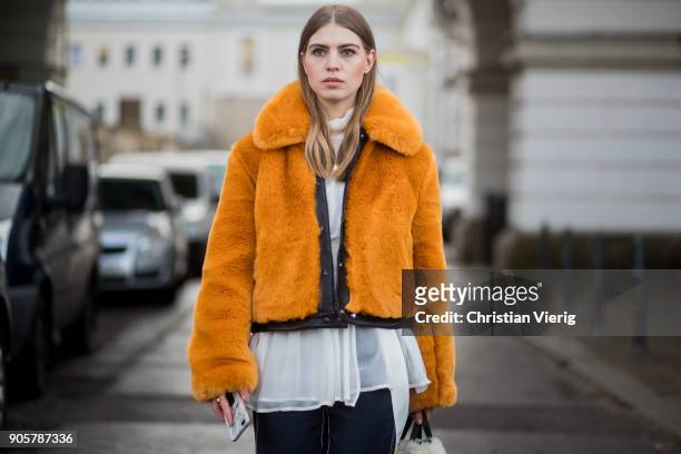 Swantje Soemmer wearing yellow H&M trend jacket, blouse and pants Sportmax, Longchamp bag, Zara ankle boots is seen outside Der Berliner Modesalon...