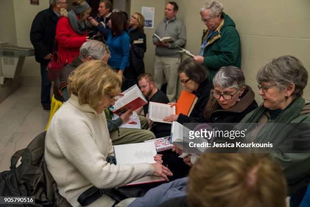 People wait in line to listen to author Michael Wolff discuss his controversial book on the Trump administration titled "Fire and Fury" with Dick...