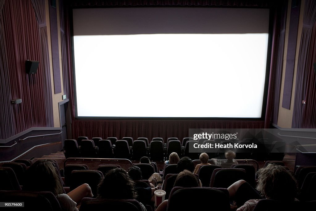 Audience at movie theater.