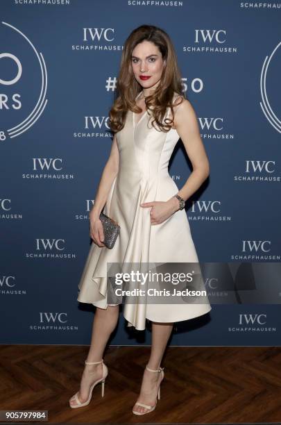 Anna Drijver visits the IWC booth during the Maison's launch of its Jubilee Collection at the Salon International de la Haute Horlogerie on January...