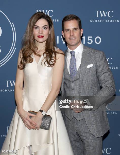 Anna Drijver and IWC Schaffhausen CEO Christoph Grainger-Herr visit the IWC booth during the Maison's launch of its Jubilee Collection at the Salon...