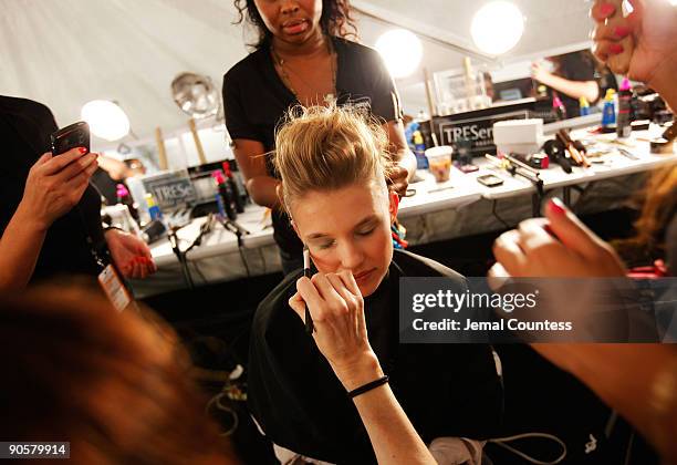 Model prepares backstage at the TRESemme at Mara Hoffman Nicholas K Whitney Eve Spring 2010 Fashion Show at the Promenade during Mercedes-Benz...