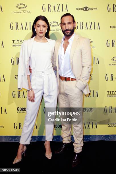 Model Rebecca Mir and her husband dancer Massimo Sinato attend the Grazia Fashion Dinner at Titanic Deluxe Hotel on January 16, 2018 in Berlin,...