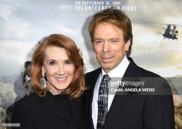 Linda Bruckheimer and Jerry Bruckheimer attend the world premiere of "12 Strong" at Jazz at Lincoln Center on January 16 in New York City. / AFP...