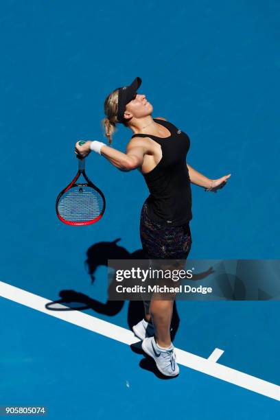 Jana Fett of Croatia serves in her second round match against Caroline Wozniacki of Denmark on day three of the 2018 Australian Open at Melbourne...