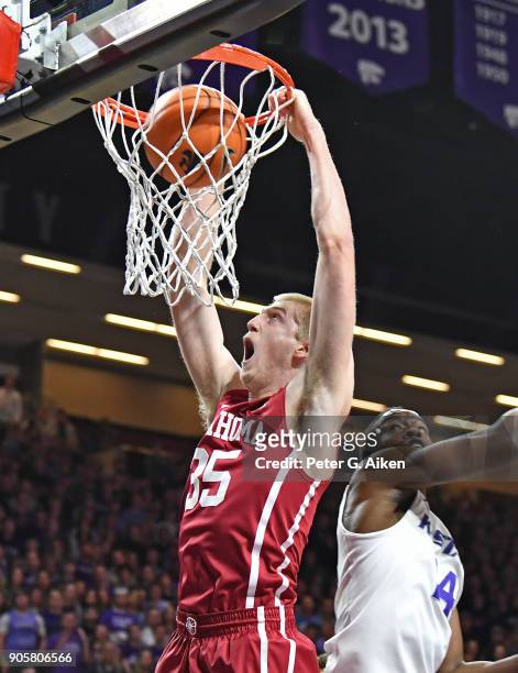 Brady Manek of the Oklahoma Sooners scores a with a dunk against the Kansas State Wildcats during the first half on January 16, 2018 at Bramlage...