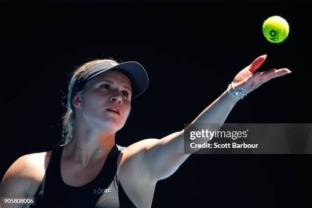 Jana Fett of Croatia serves in her second round match against Caroline Wozniacki of Denmark on day three of the 2018 Australian Open at Melbourne...