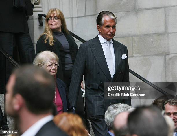 Actor George Hamilton exits the funeral of writer Dominick Dunne at The Church of St. Vincent Ferrer on September 10, 2009 in New York City. Dunne...