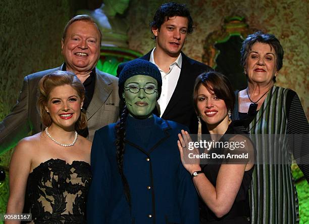 The principal cast, Bert Newton, Rob Mills, Maggie Kirkpatrick, Lucy Durack, Amanda Harrison and Penny McNamee pose during a media call for 'Wicked'...