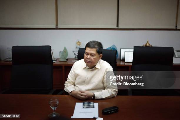 Nestor Espenilla, governor of the Bangko Sentral ng Philipinas, listens during an interview at his office in Manila, the Philippines, on Tuesday,...