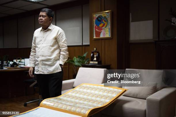 Nestor Espenilla, governor of the Bangko Sentral ng Philipinas, listens following an interview at his office in Manila, the Philippines, on Tuesday,...