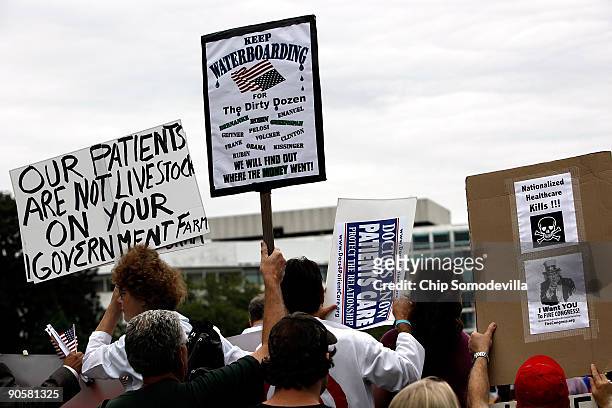 Tea Party" conservatives joined doctors and other medical professionals to rally against Congress' and President Barack Obama's health care reform...