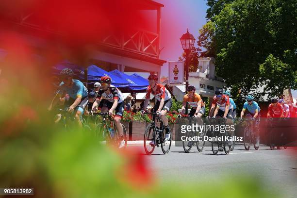 Marcel Sieberg of Germany and Lotto Soudal and Andre Greipel of Germany and Lotto Soudal compete past the German Arms in Hahndorf during stage two of...