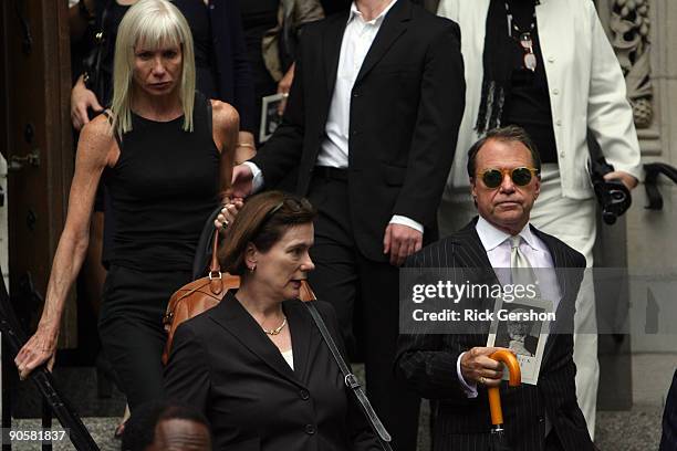 Mourners exit the funeral of writer Dominick Dunne at The Church of St. Vincent Ferrer on September 10, 2009 in New York City. Dunne was 83 when he...