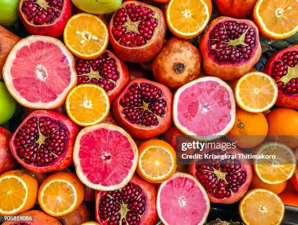 mixed fruits. - granatapfel stock-fotos und bilder