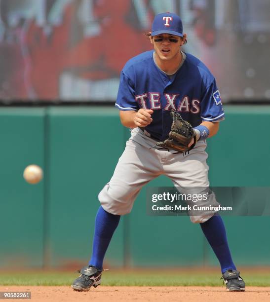 Ian Kinsler of the Texas Rangers fields against the Cleveland Indians during the game at Progressive Field on September 9, 2009 in Cleveland, Ohio....