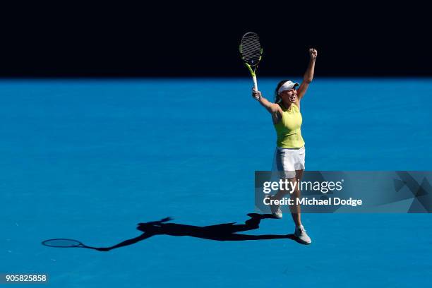 Caroline Wozniacki of Denmark celebrates winning her second round match against Jana Fett of Croatia on day three of the 2018 Australian Open at...