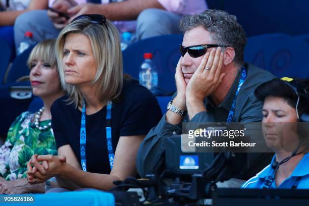 Will Ferrell and his wife Viveca Paulin watch the second round match between Caroline Wozniacki of Denmark and Jana Fett of Croatia on day three of...