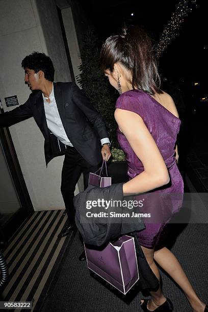 Actress Freida Pinto and actor Dev Patel are seen arriving back at their hotel in Mayfair on September 10, 2009 in London, England.