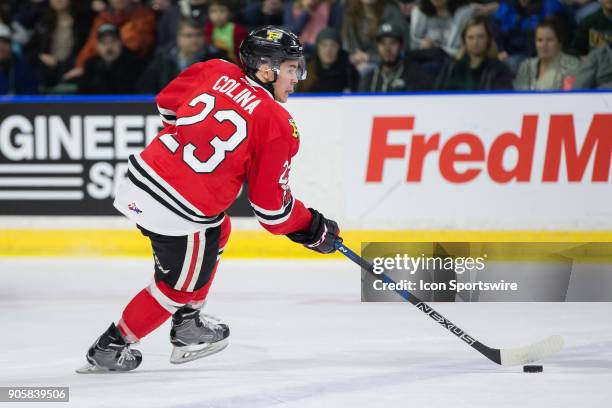 Ilijah Colina of the Portland Winterhawks skates the puck over the blue line during a game between the Everett Silvertips and the Portland...