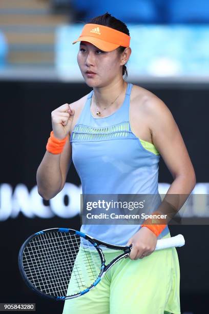 Ying-Ying Duan of China celebrates a point in her second round match against Jelena Ostapenko of Latvia on day three of the 2018 Australian Open at...