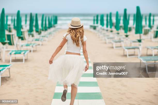 young beautiful woman on beach - jesolo stock pictures, royalty-free photos & images