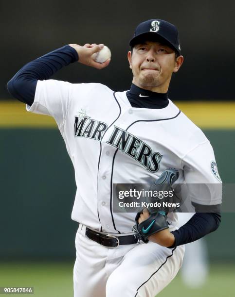 Hisashi Iwakuma of the Seattle Mariners pitches against the Los Angeles Angels in this file photo taken in Seattle on May 3, 2017. Iwakuma, who has...