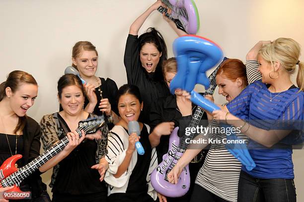 Coco Rocha takes photos with her dancers to create a flipbook during the screening of Coco Rocha: She's A Genius hosted by Modelinia.com at the...