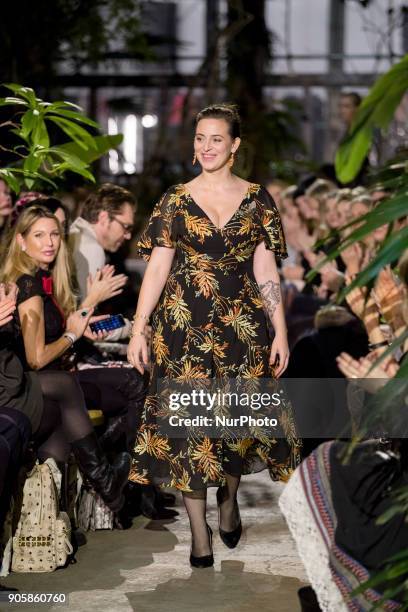 Fashion Designer Lena Hoschek acknowledges the applause of the guests at the end of her fashion show at the Botanic Garden during the Berlin Fashion...