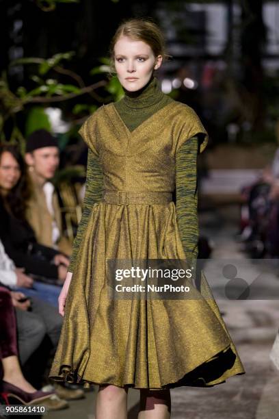 Model runs the runway at the Lena Hoschek Fashion Show at the Botanic Garden during the Berlin Fashion Week in Berlin, Germany on January 16, 2017.