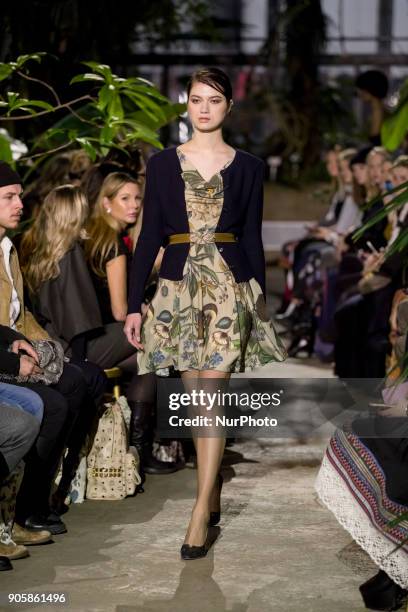 Model runs the runway at the Lena Hoschek Fashion Show at the Botanic Garden during the Berlin Fashion Week in Berlin, Germany on January 16, 2017.