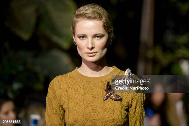Model runs the runway at the Lena Hoschek Fashion Show at the Botanic Garden during the Berlin Fashion Week in Berlin, Germany on January 16, 2017.