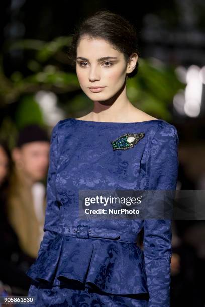 Model runs the runway at the Lena Hoschek Fashion Show at the Botanic Garden during the Berlin Fashion Week in Berlin, Germany on January 16, 2017.