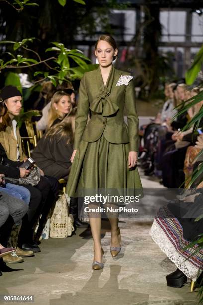 Model runs the runway at the Lena Hoschek Fashion Show at the Botanic Garden during the Berlin Fashion Week in Berlin, Germany on January 16, 2017.