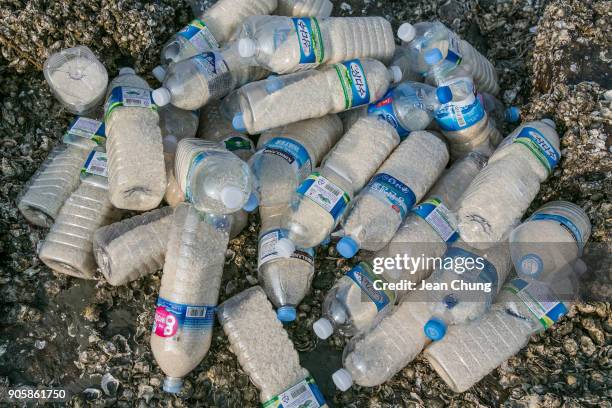 Bottles with rice are shown on an island near the DMZ on January 17, 2018 in Incheon, South Korea. The human rights group organised by North Korean...