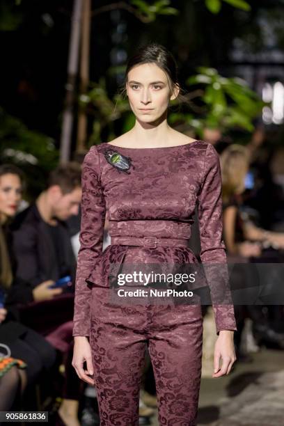 Model runs the runway at the Lena Hoschek Fashion Show at the Botanic Garden during the Berlin Fashion Week in Berlin, Germany on January 16, 2017.