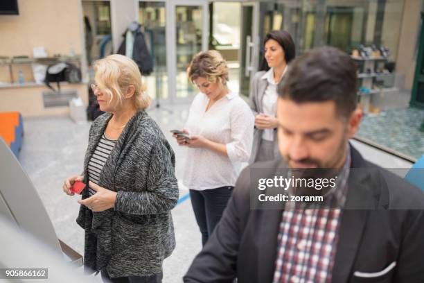 People Waiting In Queue Bank Queue Photos and Premium High Res Pictures - Getty Images