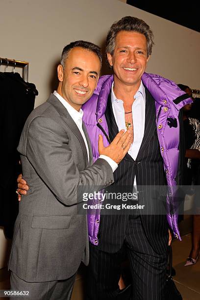 Francisco Costa and Carlos Souza attend the celebration for Fashion's Night Out at Calvin Klein Boutique on September 10, 2009 in New York City.