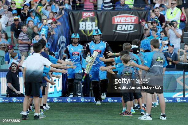 Jake Weatherald and Alex Carey of the Adelaide Strikers open the batting during the Big Bash League match between the Adelaide Strikers and the...