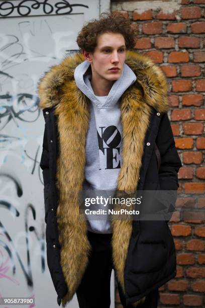 Guest is seen outside Fendi during Milan Men's Fashion Week Fall/Winter 2018/19 on January 15, 2018 in Milan, Italy.